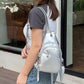 Women's Convertible Sling Backpack with Charm